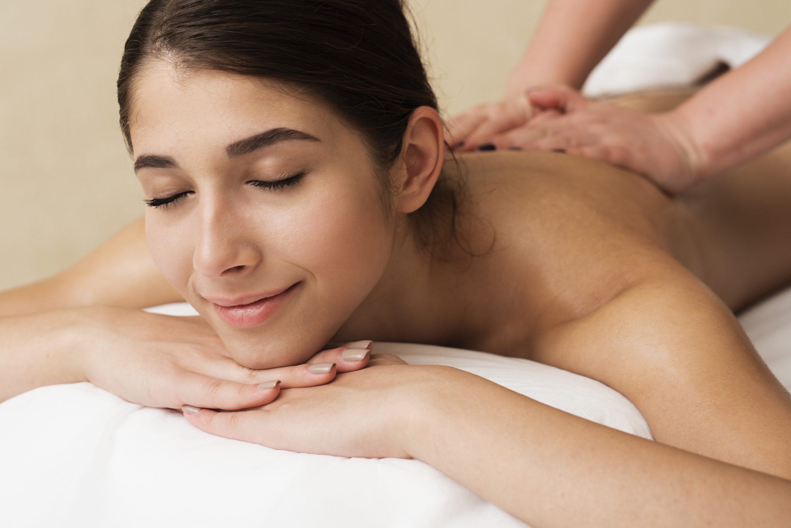 close up relaxed girl getting massage
