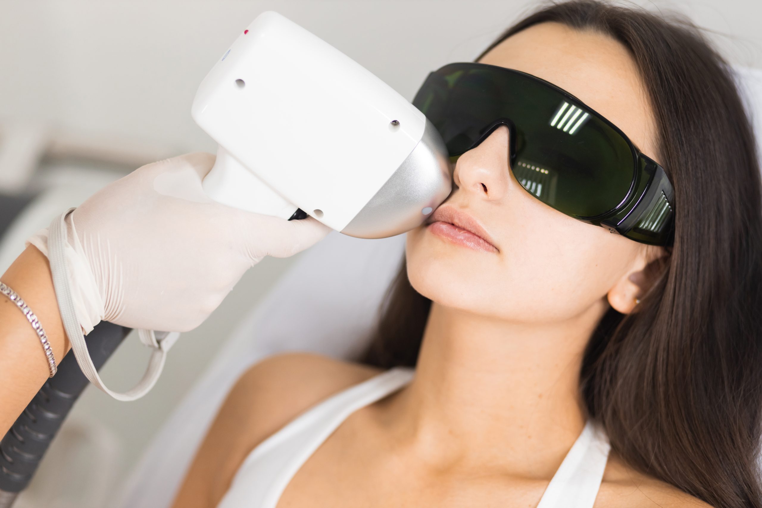 laser hair removal for facial skin. woman in epilation salon